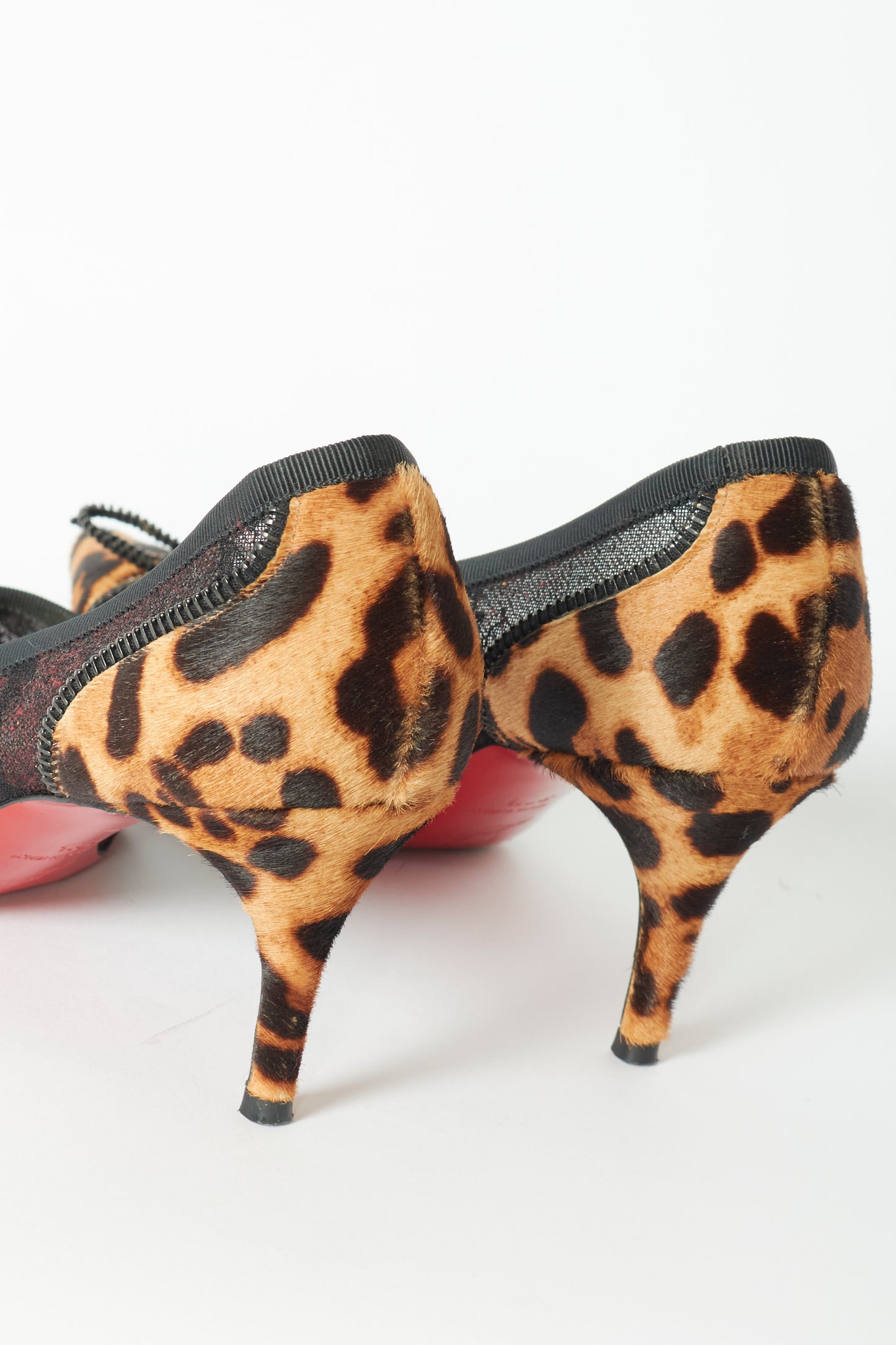 Christian Louboutin Leopard Pony Hair & Black Mesh Pumps