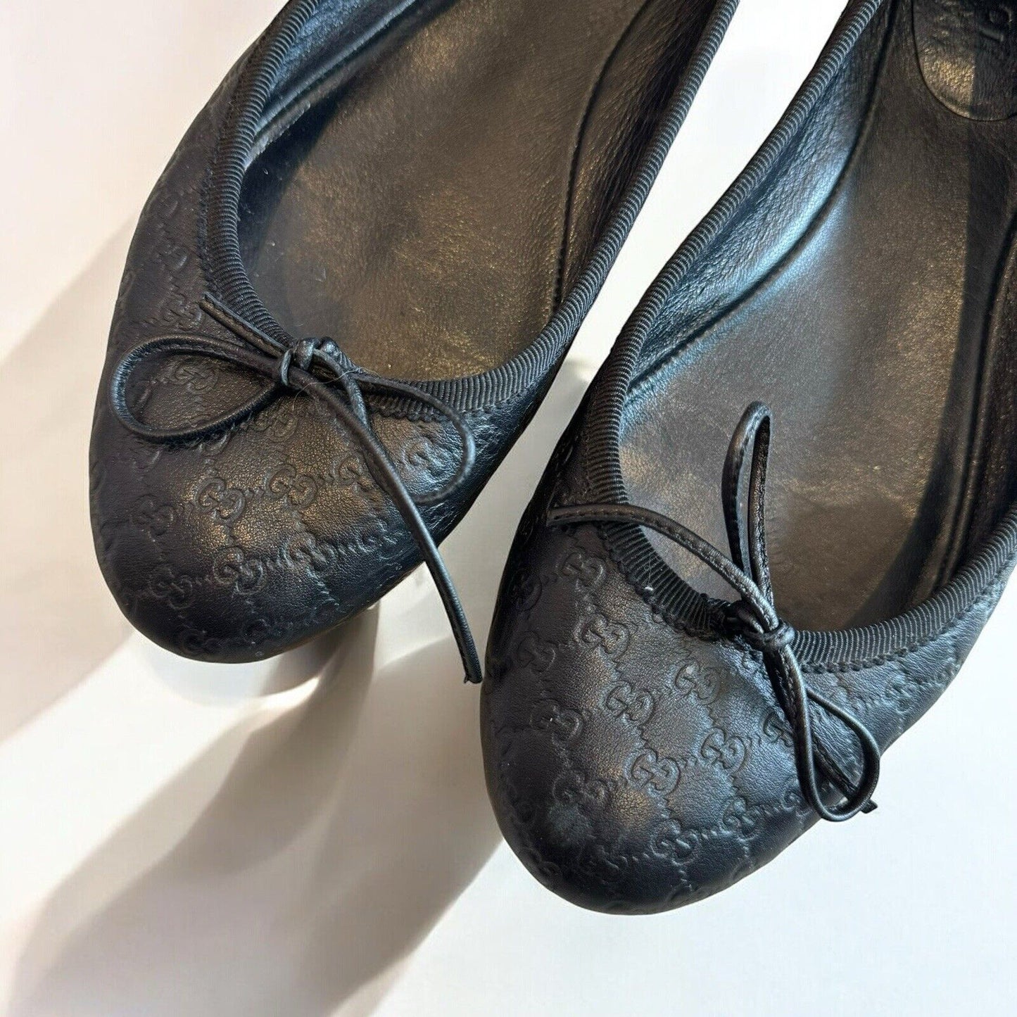 Gucci Black Embossed Monogram Leather Bow Ballet Flats Size 38